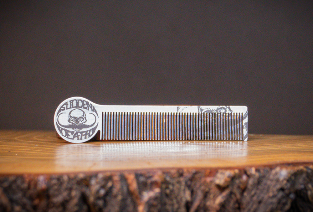 Handcrafted steel Death Grip mustache comb with fine teeth for styling