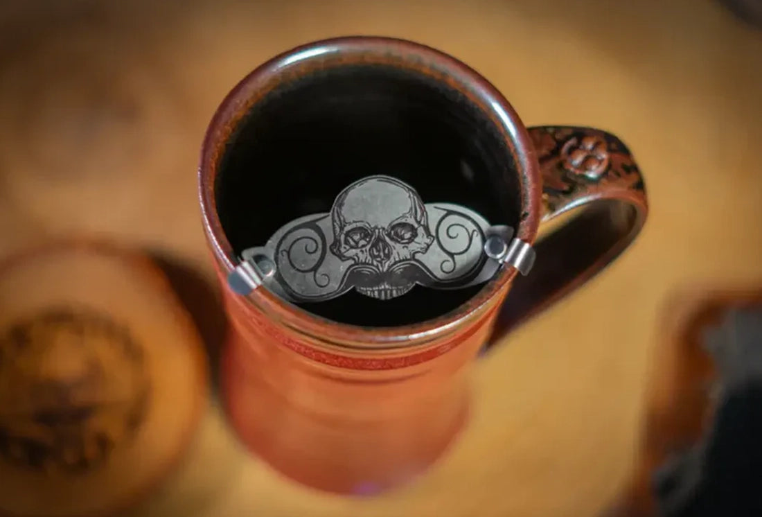 Death Grip Defender mustache guard on mug for protecting mustache while drinking